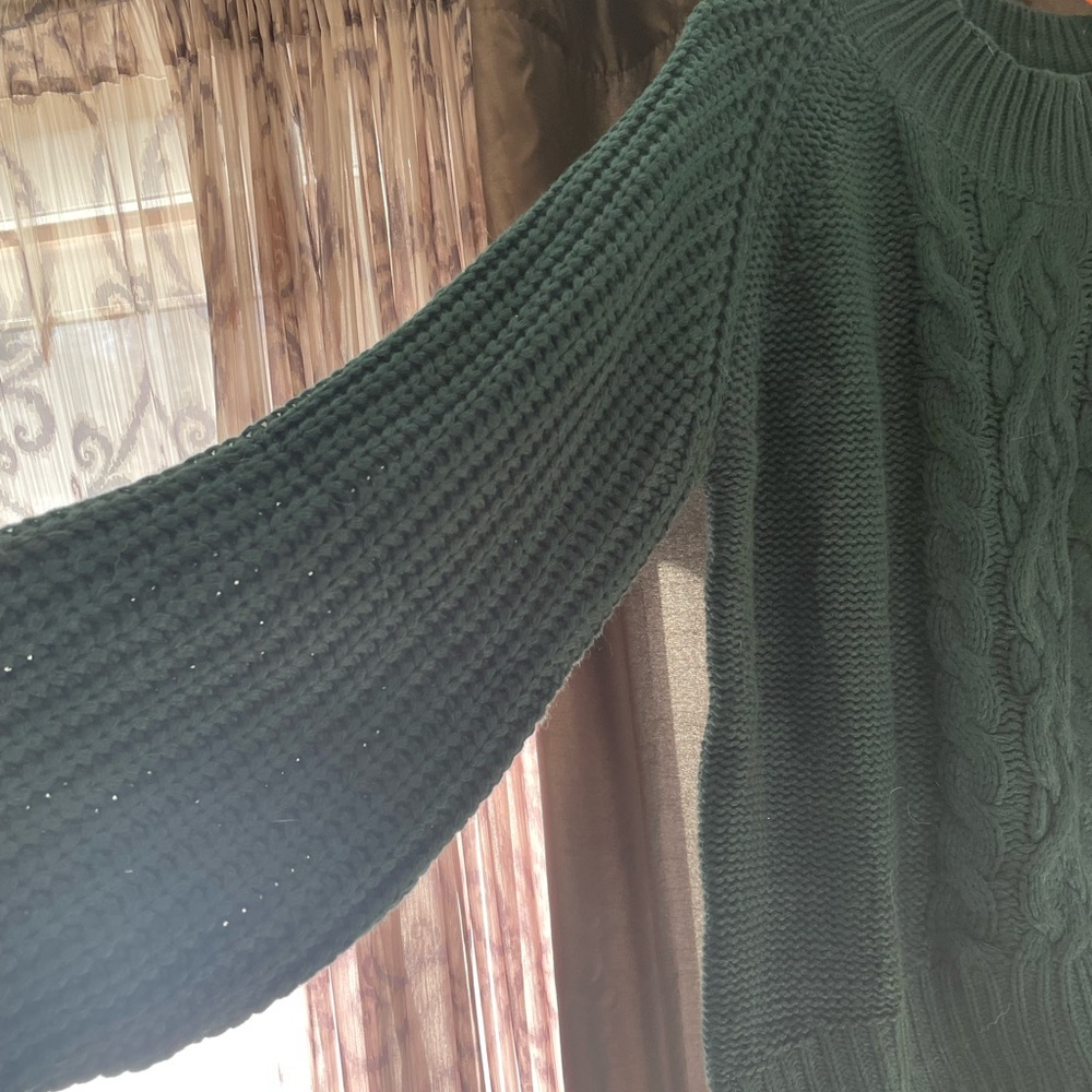Dark green cable sweater